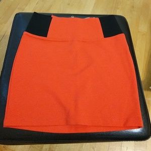 Red body con skirt, size XS